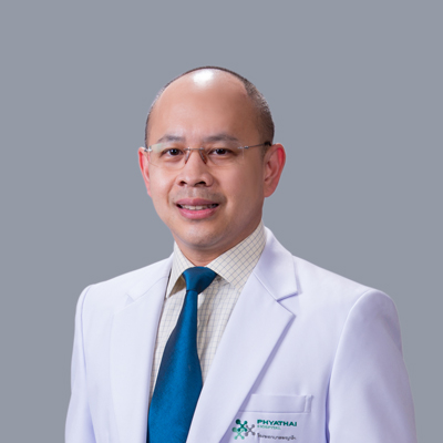 Dr.  Tanan Jaruprakorn