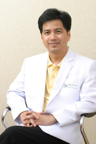 Dr.  Suchit Poonthong